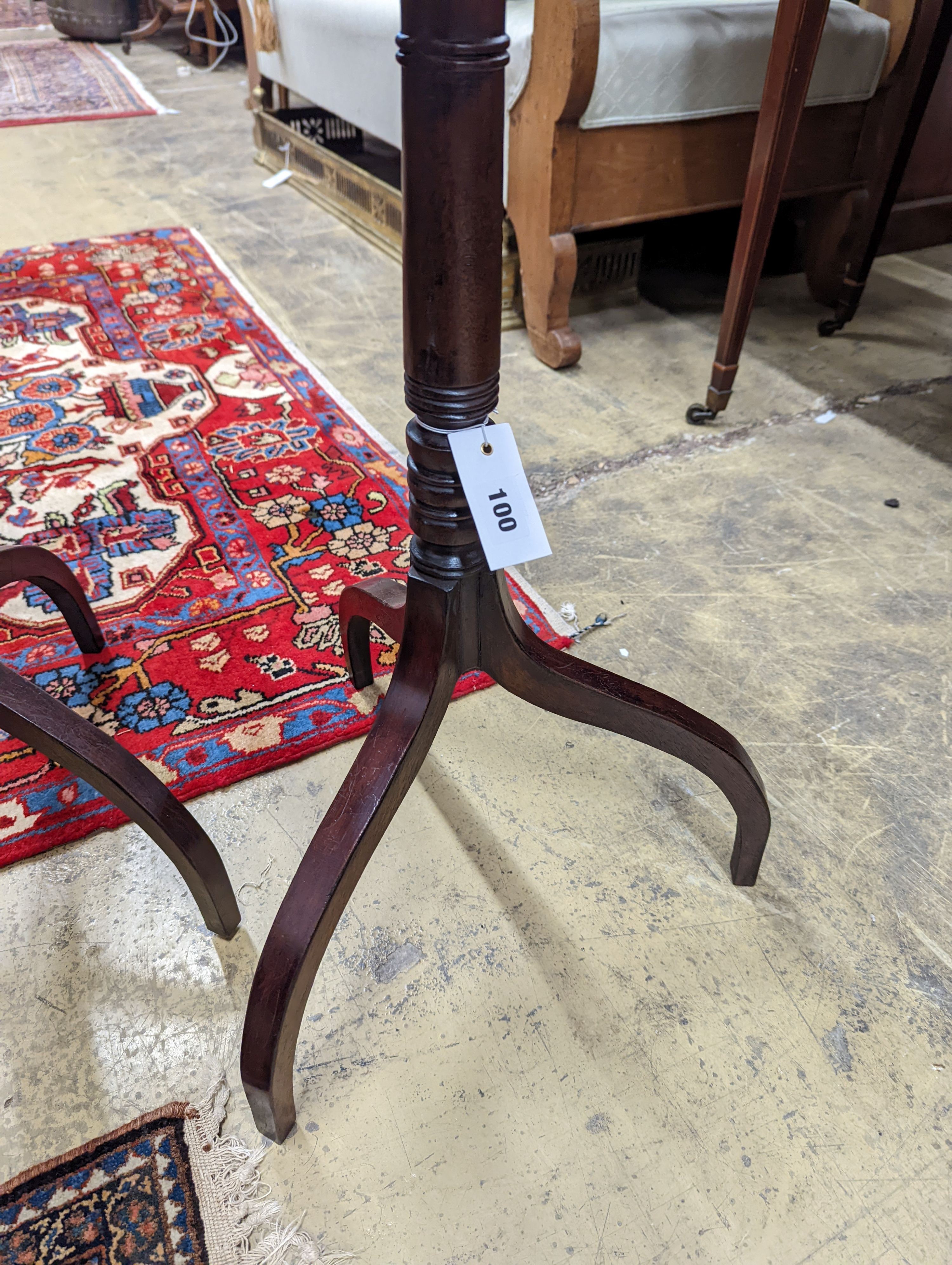 A pair of Regency style mahogany octagonal tripod wine tables, width 38cm, height 77cm